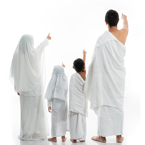 asian muslim family hajj shot from behind